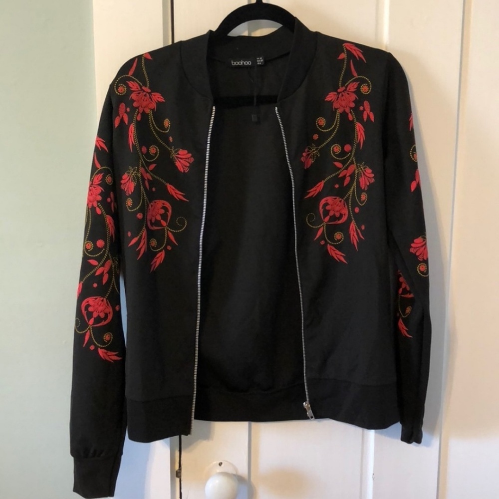 Black bomber jacket with detailed sleeves
